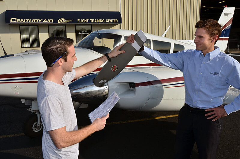 Student pilot consultation at Century Air flight school, Essex County Airport, Caldwell New Jersey near NYC