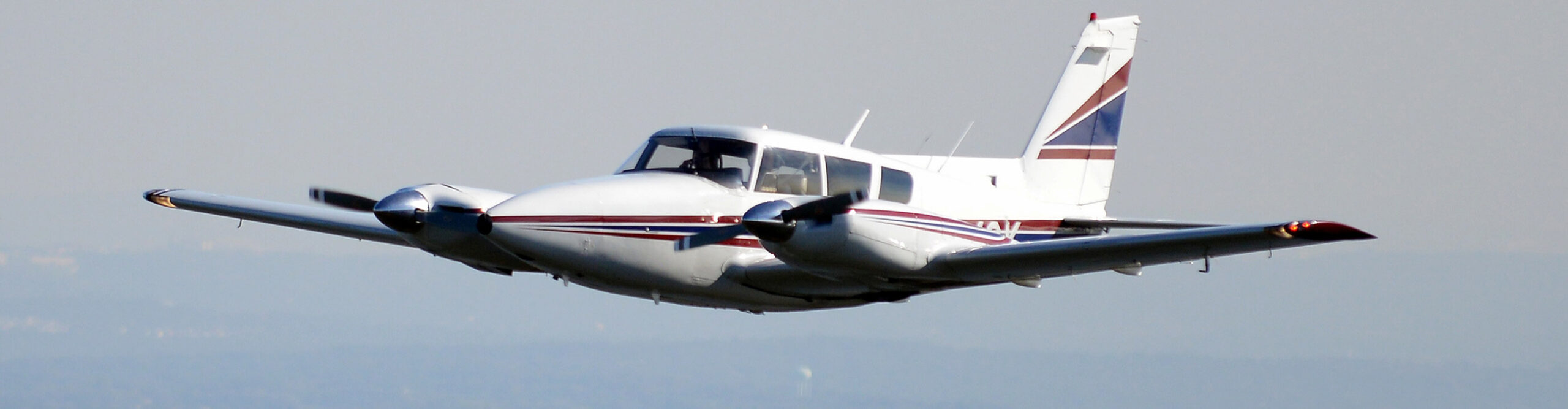 Century Air's Twin Comanche in flight over NJ